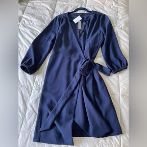 J Crew brand new women’s wrap dress. With tags. Very flattering. Women’s 14